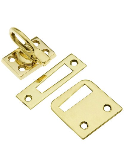 Solid Brass Casement Window Latch with Ring Handle in Unlacquered Brass.